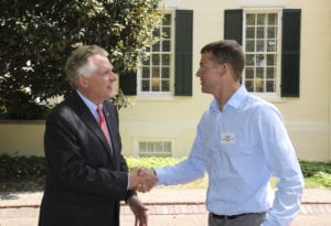 Governor McAuliffe greets Torc CEO Michael Fleming.