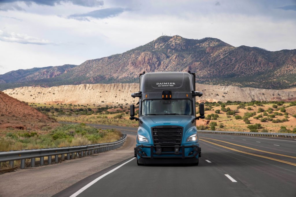 Torc self-driving freight truck driving on highway outside of Albuquerque